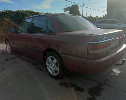 Красный Мазда 626, объемом двигателя 2 л и пробегом 226 тыс. км за 1200 $, фото 3 на Automoto.ua