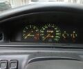 Красный Мазда 626, объемом двигателя 2 л и пробегом 418 тыс. км за 1300 $, фото 4 на Automoto.ua