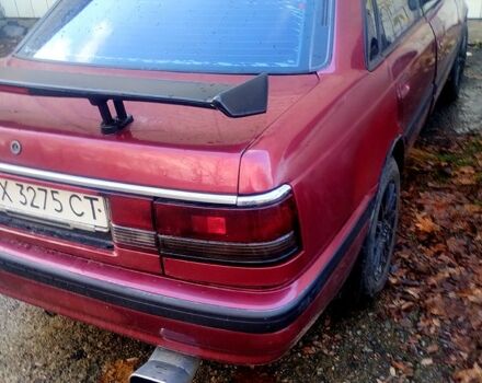 Червоний Мазда 626, об'ємом двигуна 2 л та пробігом 365 тис. км за 450 $, фото 1 на Automoto.ua