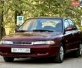 Червоний Мазда 626, об'ємом двигуна 2 л та пробігом 210 тис. км за 1450 $, фото 1 на Automoto.ua