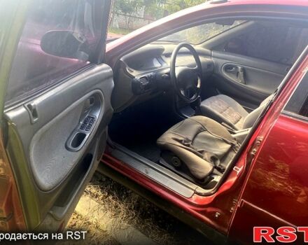 Красный Мазда 626, объемом двигателя 2 л и пробегом 258 тыс. км за 760 $, фото 1 на Automoto.ua