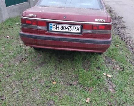 Красный Мазда 626, объемом двигателя 2 л и пробегом 225 тыс. км за 550 $, фото 2 на Automoto.ua