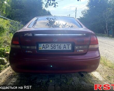 Красный Мазда 626, объемом двигателя 2 л и пробегом 258 тыс. км за 760 $, фото 2 на Automoto.ua