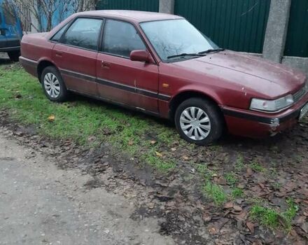 Красный Мазда 626, объемом двигателя 2 л и пробегом 225 тыс. км за 550 $, фото 1 на Automoto.ua