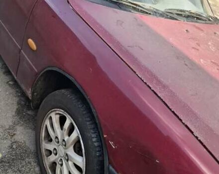 Красный Мазда 626, объемом двигателя 1.99 л и пробегом 380 тыс. км за 1500 $, фото 2 на Automoto.ua