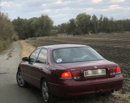 Красный Мазда 626, объемом двигателя 2 л и пробегом 3 тыс. км за 3000 $, фото 3 на Automoto.ua