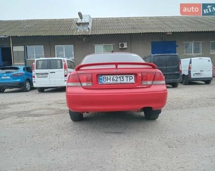 Красный Мазда 626, объемом двигателя 2 л и пробегом 210 тыс. км за 2600 $, фото 2 на Automoto.ua