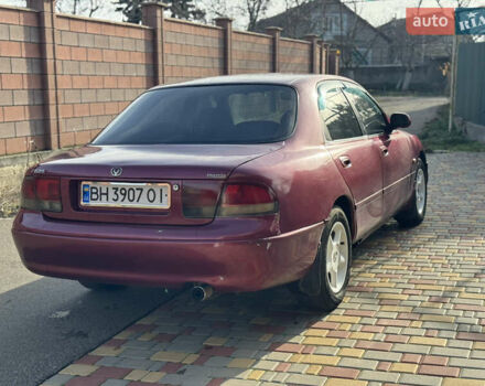 Червоний Мазда 626, об'ємом двигуна 1.84 л та пробігом 290 тис. км за 1500 $, фото 4 на Automoto.ua