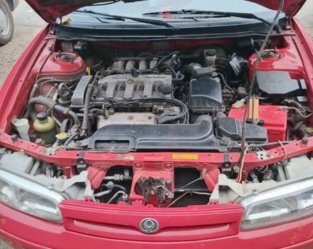 Красный Мазда 626, объемом двигателя 2 л и пробегом 210 тыс. км за 2600 $, фото 13 на Automoto.ua