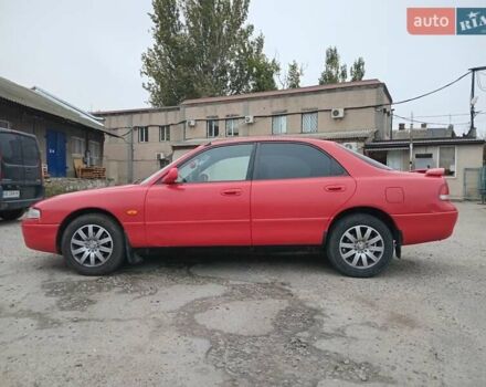 Красный Мазда 626, объемом двигателя 2 л и пробегом 210 тыс. км за 2600 $, фото 1 на Automoto.ua