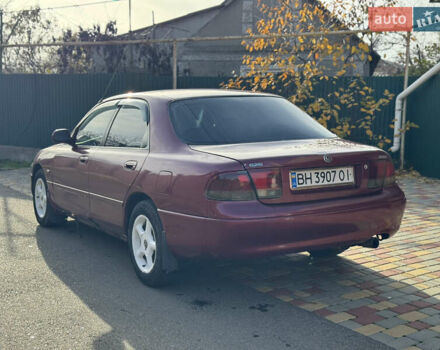 Червоний Мазда 626, об'ємом двигуна 1.84 л та пробігом 290 тис. км за 1500 $, фото 3 на Automoto.ua