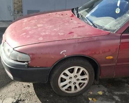 Красный Мазда 626, объемом двигателя 1.99 л и пробегом 380 тыс. км за 1500 $, фото 7 на Automoto.ua