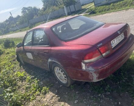 Красный Мазда 626, объемом двигателя 1.8 л и пробегом 300 тыс. км за 750 $, фото 4 на Automoto.ua