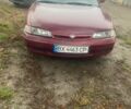 Красный Мазда 626, объемом двигателя 2 л и пробегом 300 тыс. км за 1350 $, фото 1 на Automoto.ua