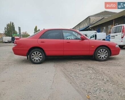 Красный Мазда 626, объемом двигателя 2 л и пробегом 210 тыс. км за 2600 $, фото 3 на Automoto.ua