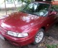 Красный Мазда 626, объемом двигателя 1.8 л и пробегом 250 тыс. км за 896 $, фото 1 на Automoto.ua