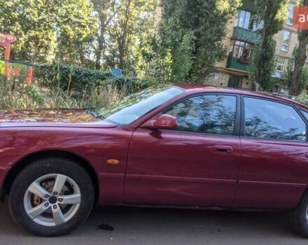 Красный Мазда 626, объемом двигателя 2 л и пробегом 230 тыс. км за 2200 $, фото 4 на Automoto.ua