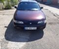 Красный Мазда 626, объемом двигателя 2 л и пробегом 300 тыс. км за 2004 $, фото 1 на Automoto.ua