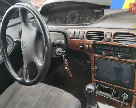 Красный Мазда 626, объемом двигателя 2 л и пробегом 220 тыс. км за 2000 $, фото 12 на Automoto.ua