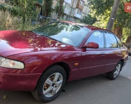Красный Мазда 626, объемом двигателя 2 л и пробегом 230 тыс. км за 2200 $, фото 5 на Automoto.ua