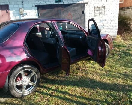 Красный Мазда 626, объемом двигателя 1.8 л и пробегом 300 тыс. км за 1700 $, фото 4 на Automoto.ua