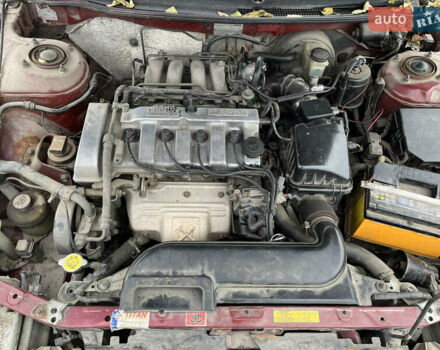 Красный Мазда 626, объемом двигателя 2 л и пробегом 276 тыс. км за 1800 $, фото 9 на Automoto.ua