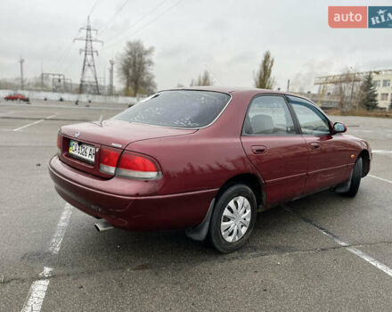 Красный Мазда 626, объемом двигателя 2 л и пробегом 276 тыс. км за 1800 $, фото 4 на Automoto.ua
