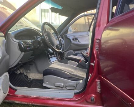 Красный Мазда 626, объемом двигателя 2 л и пробегом 561 тыс. км за 1600 $, фото 9 на Automoto.ua