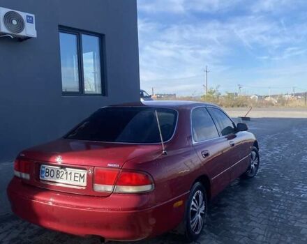 Красный Мазда 626, объемом двигателя 2 л и пробегом 561 тыс. км за 1600 $, фото 5 на Automoto.ua
