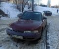 Красный Мазда 626, объемом двигателя 2 л и пробегом 290 тыс. км за 700 $, фото 1 на Automoto.ua
