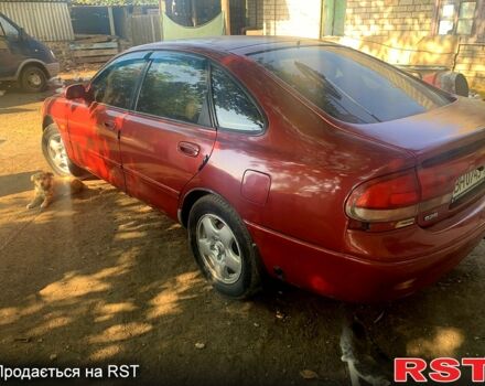 Красный Мазда 626, объемом двигателя 1.8 л и пробегом 300 тыс. км за 1600 $, фото 2 на Automoto.ua