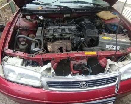 Красный Мазда 626, объемом двигателя 1.8 л и пробегом 400 тыс. км за 650 $, фото 3 на Automoto.ua