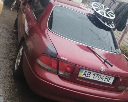 Красный Мазда 626, объемом двигателя 1.8 л и пробегом 400 тыс. км за 650 $, фото 1 на Automoto.ua