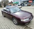Красный Мазда 626, объемом двигателя 2 л и пробегом 300 тыс. км за 2200 $, фото 1 на Automoto.ua