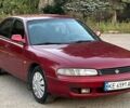Красный Мазда 626, объемом двигателя 2 л и пробегом 250 тыс. км за 1400 $, фото 4 на Automoto.ua