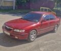 Червоний Мазда 626, об'ємом двигуна 2 л та пробігом 570 тис. км за 2700 $, фото 3 на Automoto.ua