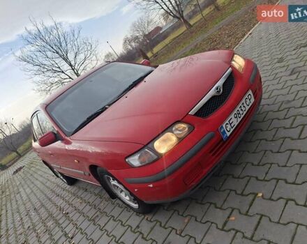 Красный Мазда 626, объемом двигателя 2 л и пробегом 111 тыс. км за 1800 $, фото 12 на Automoto.ua