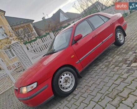 Красный Мазда 626, объемом двигателя 2 л и пробегом 111 тыс. км за 1800 $, фото 16 на Automoto.ua