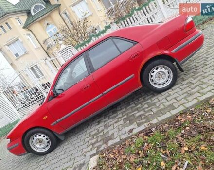 Красный Мазда 626, объемом двигателя 2 л и пробегом 111 тыс. км за 1800 $, фото 2 на Automoto.ua