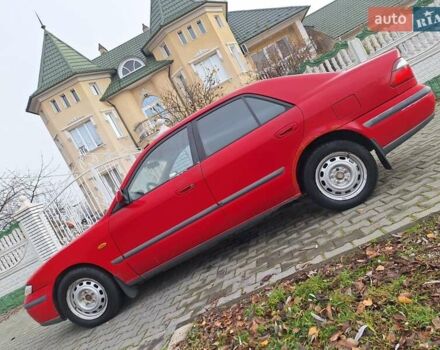 Красный Мазда 626, объемом двигателя 2 л и пробегом 111 тыс. км за 1800 $, фото 1 на Automoto.ua