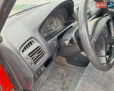 Красный Мазда 626, объемом двигателя 2 л и пробегом 111 тыс. км за 1800 $, фото 32 на Automoto.ua