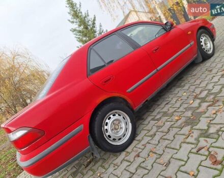Красный Мазда 626, объемом двигателя 2 л и пробегом 111 тыс. км за 1800 $, фото 9 на Automoto.ua