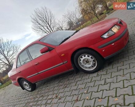 Красный Мазда 626, объемом двигателя 2 л и пробегом 111 тыс. км за 1800 $, фото 11 на Automoto.ua