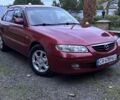 Червоний Мазда 626, об'ємом двигуна 2 л та пробігом 300 тис. км за 3214 $, фото 1 на Automoto.ua