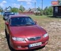 Красный Мазда 626, объемом двигателя 2 л и пробегом 300 тыс. км за 3250 $, фото 1 на Automoto.ua