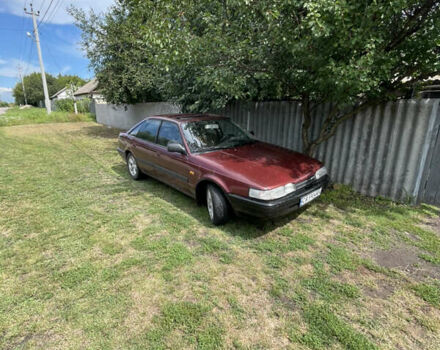 Красный Мазда 626, объемом двигателя 2 л и пробегом 235 тыс. км за 1600 $, фото 1 на Automoto.ua