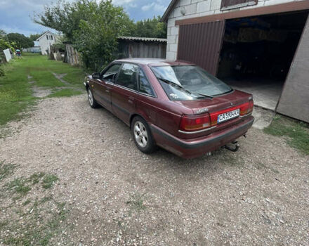 Красный Мазда 626, объемом двигателя 2 л и пробегом 235 тыс. км за 1600 $, фото 2 на Automoto.ua