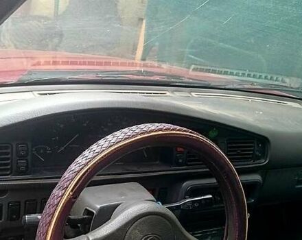 Красный Мазда 626, объемом двигателя 2 л и пробегом 23 тыс. км за 700 $, фото 1 на Automoto.ua