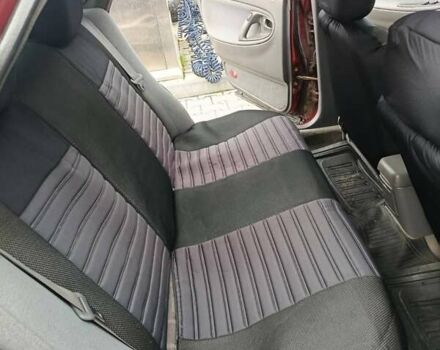 Красный Мазда 626, объемом двигателя 1.8 л и пробегом 365 тыс. км за 1800 $, фото 3 на Automoto.ua