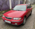 Красный Мазда 626, объемом двигателя 1.8 л и пробегом 333 тыс. км за 1700 $, фото 1 на Automoto.ua